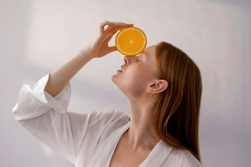 medium-shot-woman-posing-with-orange-slice (1).jpg medium-shot-woman-posing-with-orange-slice (1).jpg